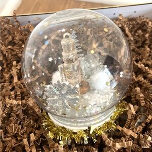 Snow globe DIY glitter Nutcracker craft kit with supplies.